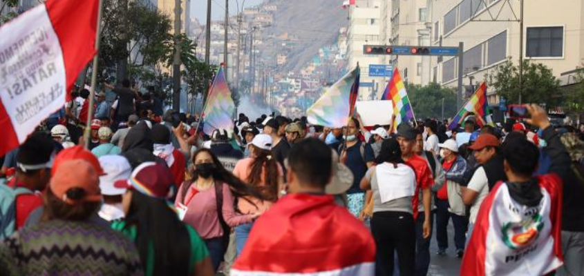 Protesters march in Lima