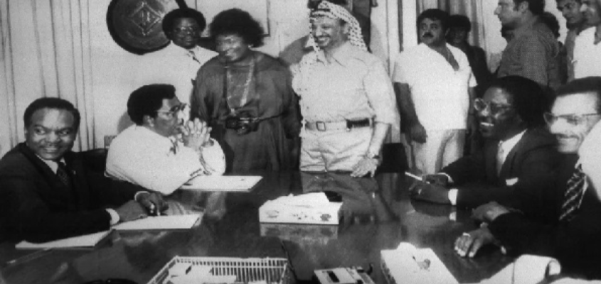 Representatives of the Southern Christian Leadership Conference (SCLC) meet with Palestine Liberation Organization (PLO) Chair Yasser Arafat.