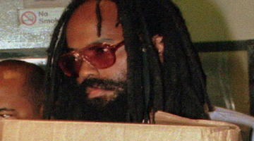 Mumia Gets, and Gives, literary Praise