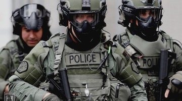 US Cops Act Like Soldiers, While US Soldiers Police the World 