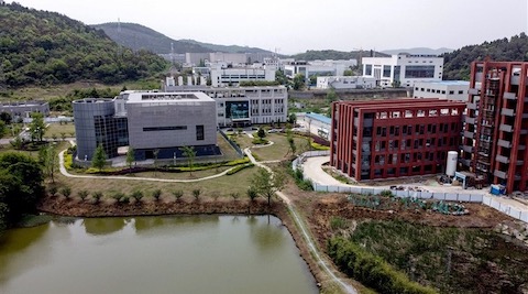 Why is Sam Husseini Channeling Neocon Conspiracy Theories on Covid-19? . Photo of lab in Wuhan, China
