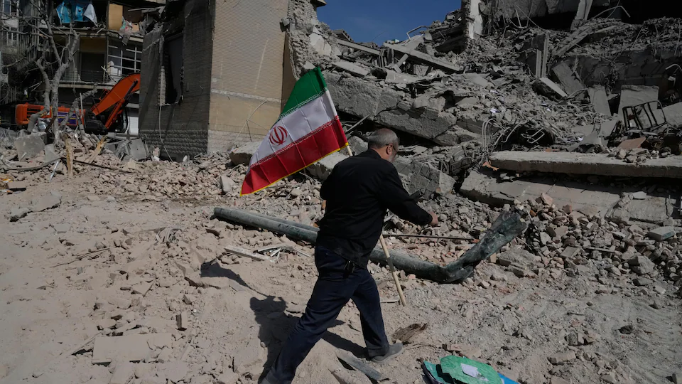 Man carrying Iranian flag