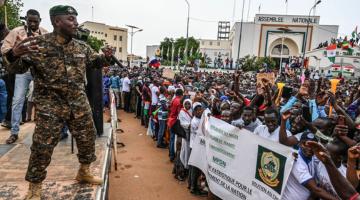 Niger army sergeant and artist Maman Sani Maigochi performs as supporters gather at Place de la Concertation in the capital Niamey