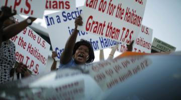 save TPS protest